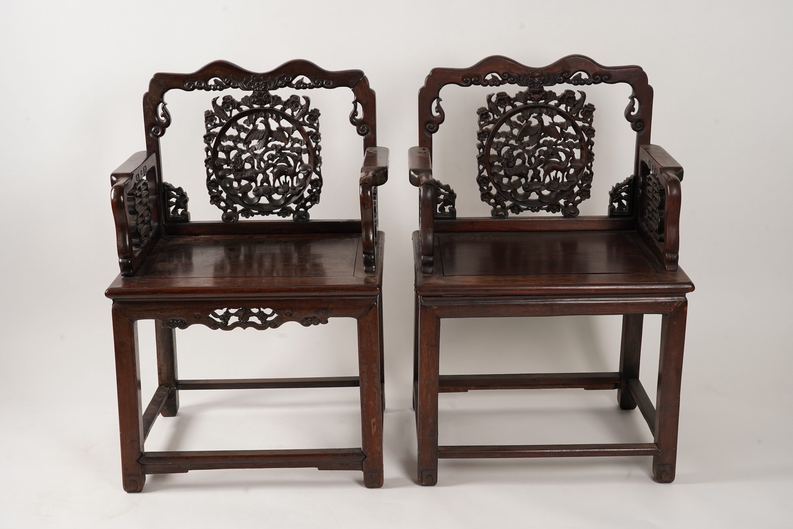 A pair of Chinese hongmu armchairs, late 19th century